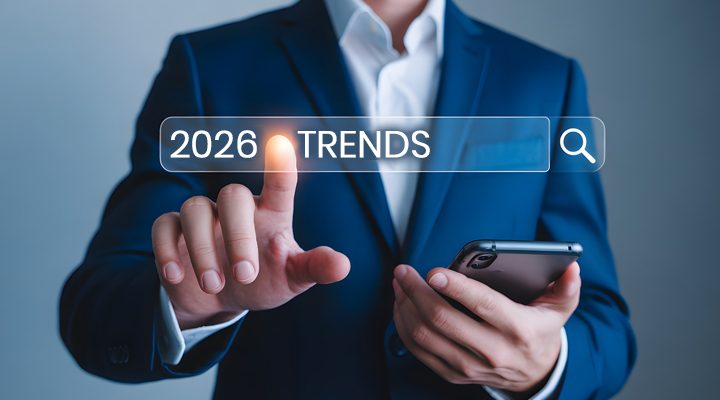 businessman holding cell phone 2026